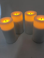Set of 4 white slim candles